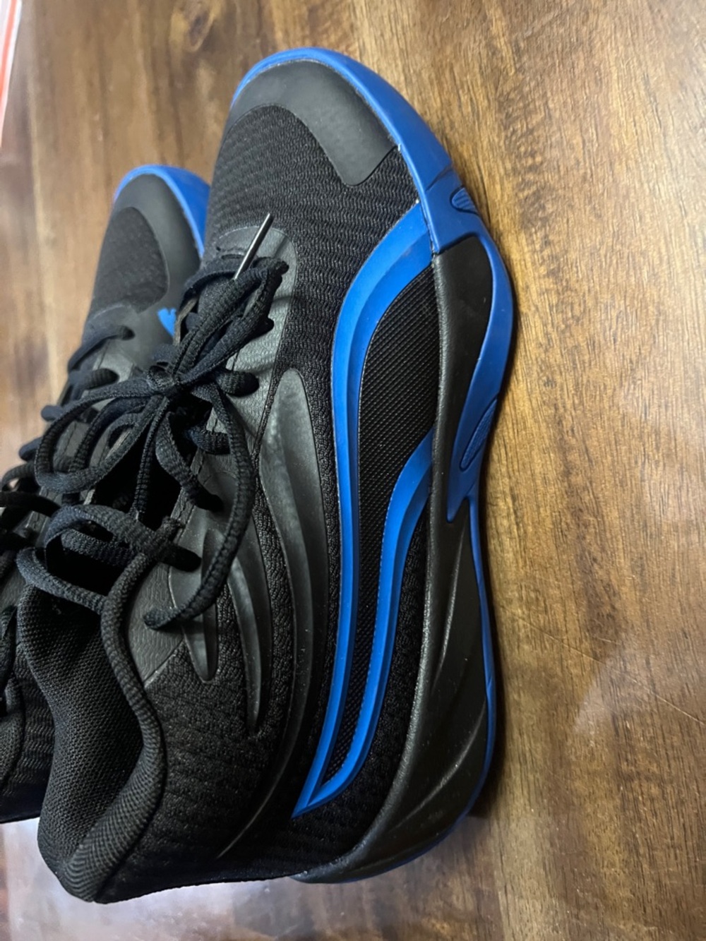Puma Black Sneakers with Blue Accents